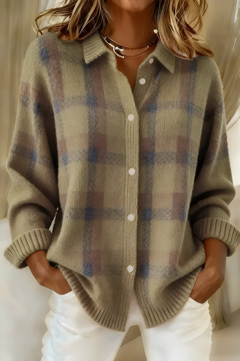 Woman wearing oversized plaid button-up knit cardigan