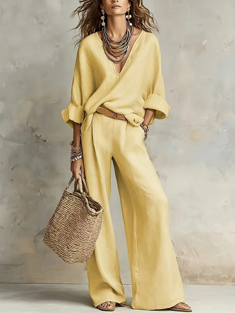 Woman wearing two piece set with wide leg pants