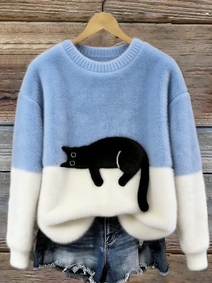 Woman wearing cat design knit sweater with long sleeves