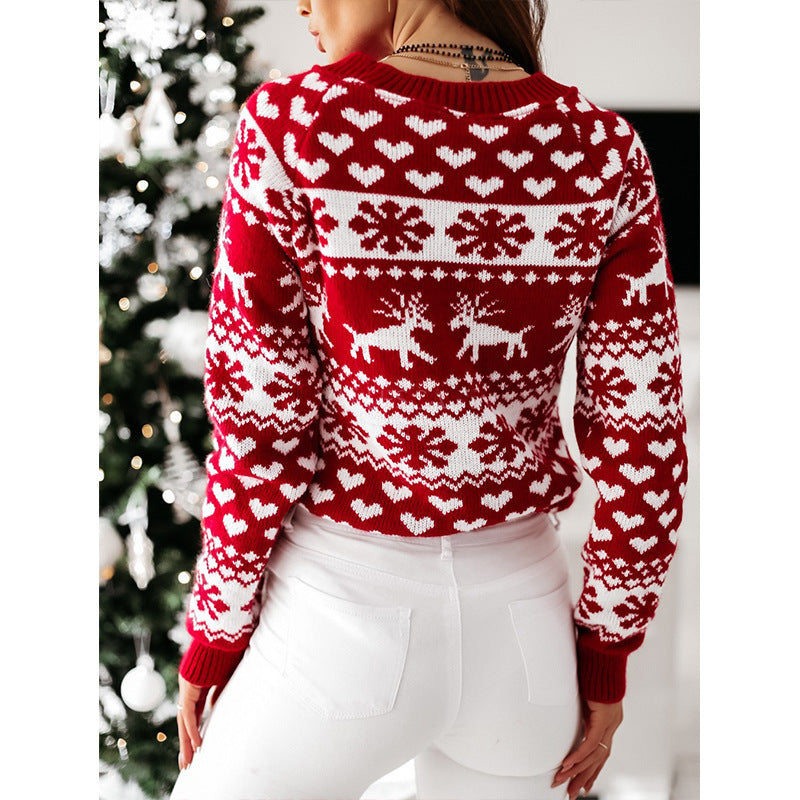 Women's red knit Christmas sweater with elk and snowflake pattern
