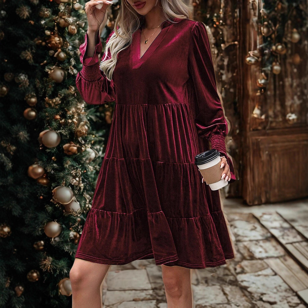 Woman wearing velvet V-neck mini dress with puffy sleeves