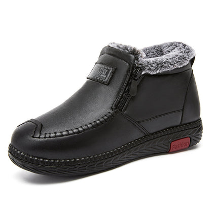 Women's black plush lined winter ankle boots with flat heel