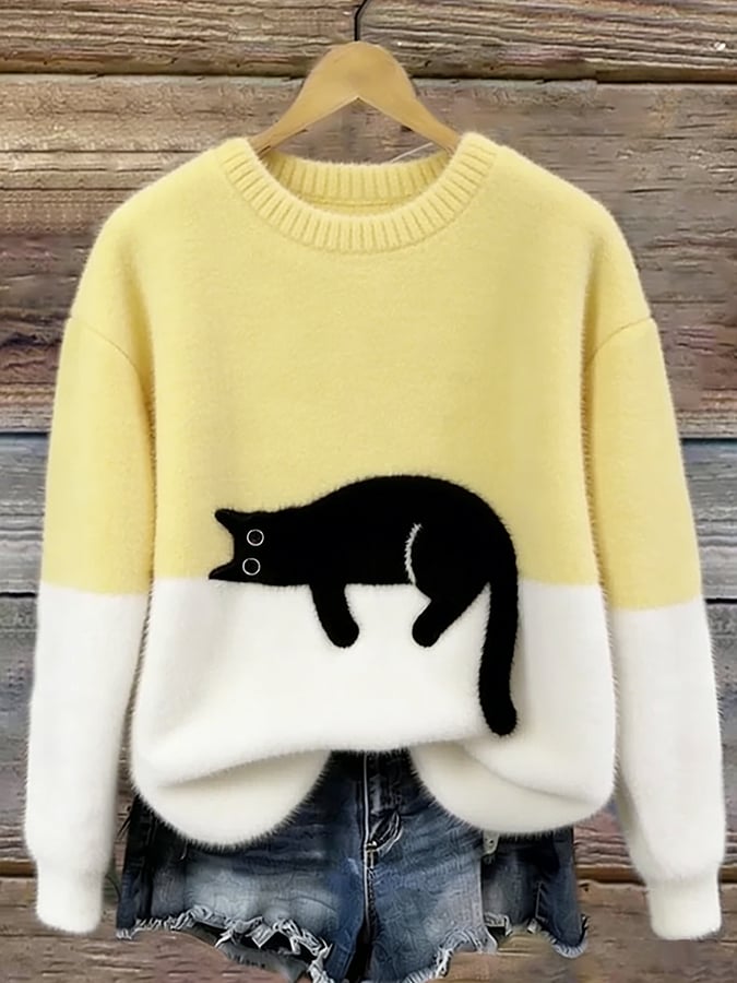 Woman wearing cat design knit sweater with long sleeves