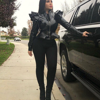 Woman wearing black leather jacket with ruffle edge