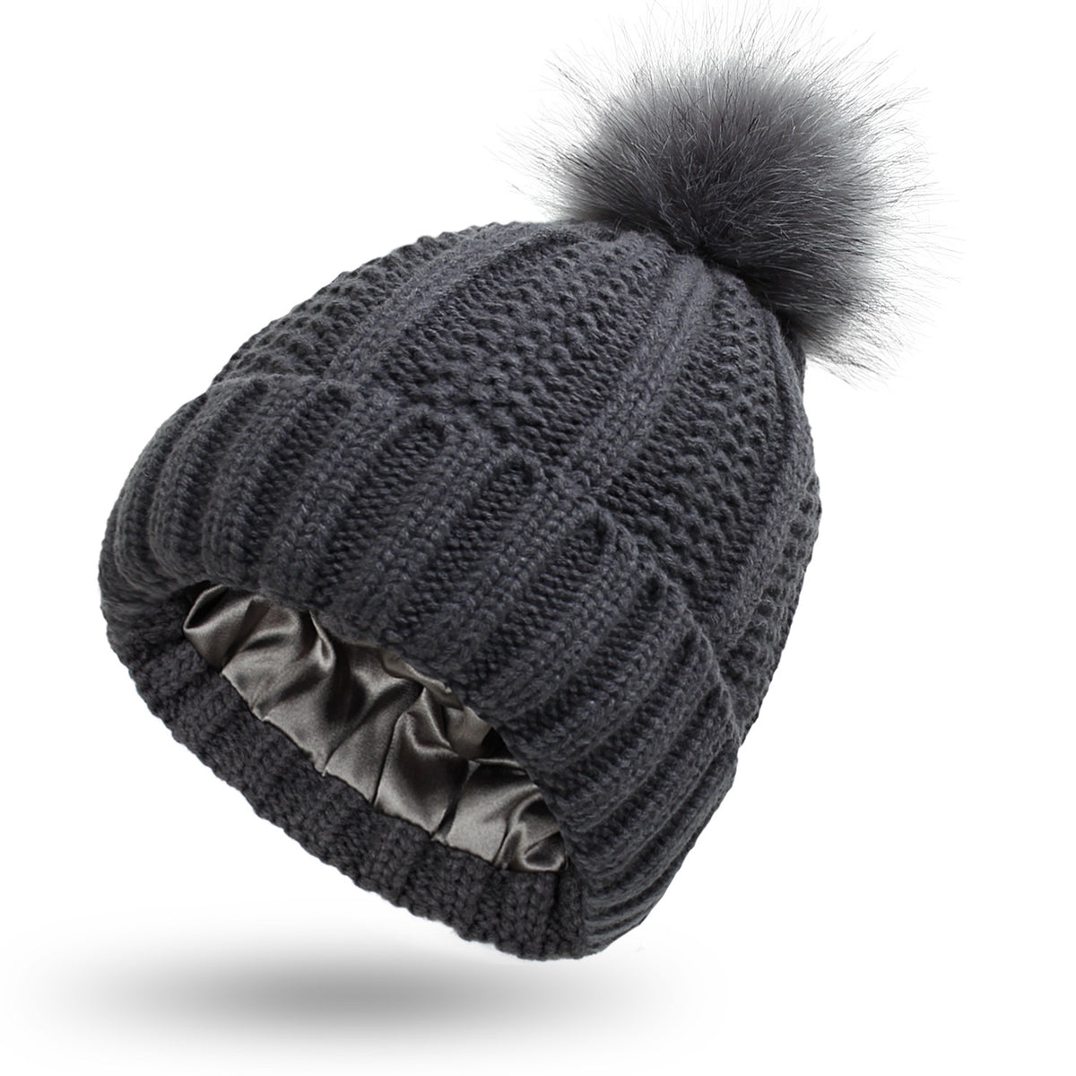 Women's knit beanie with faux fur pom pom