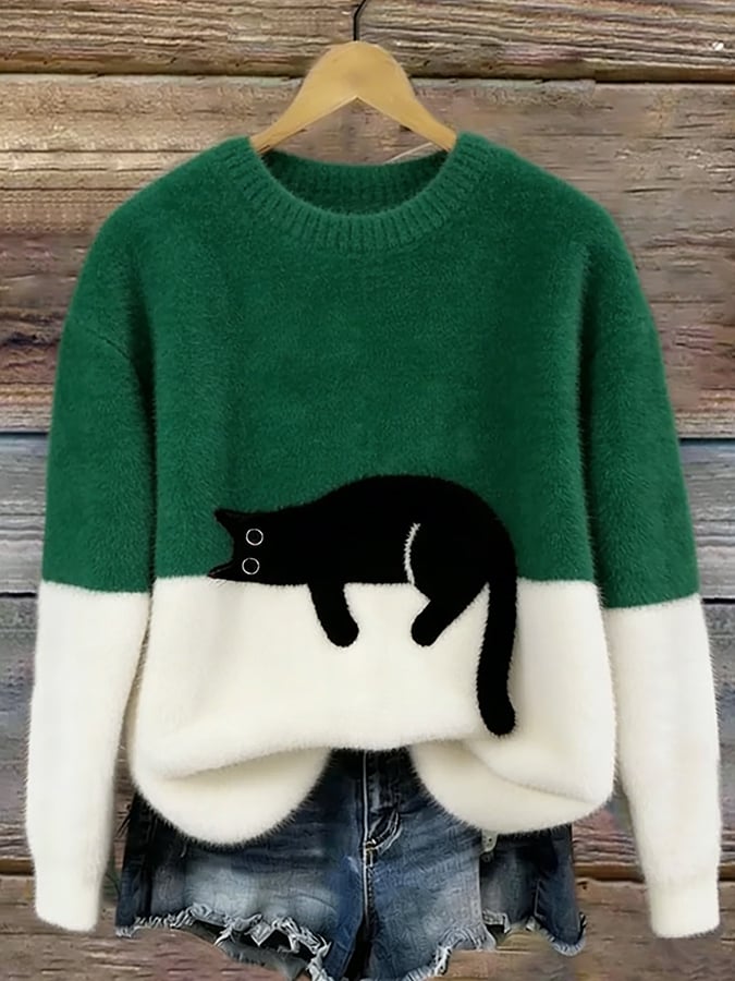 Woman wearing cat design knit sweater with long sleeves