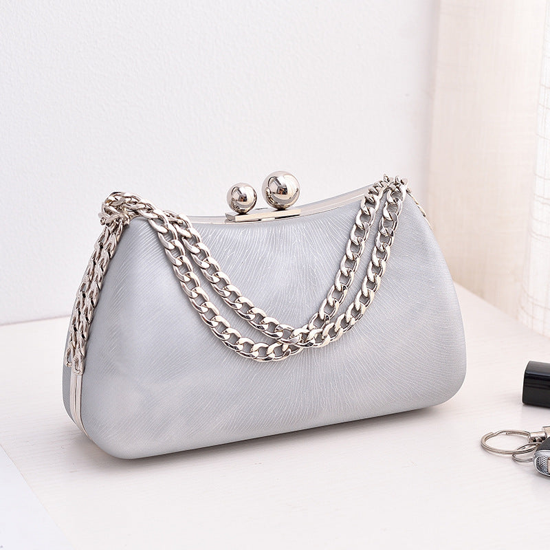 Women's chain shoulder bag with embossed pillow shape