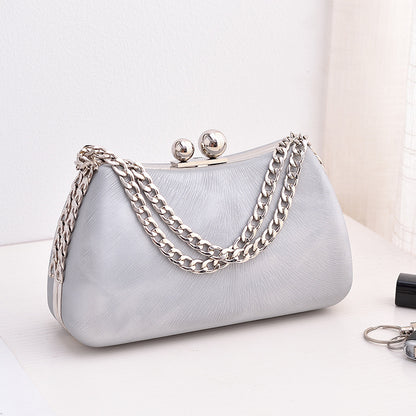 Women's chain shoulder bag with embossed pillow shape