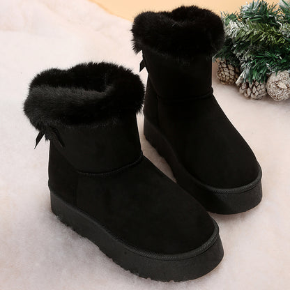 Women's black bow detail mid-top snow boots with plush lining