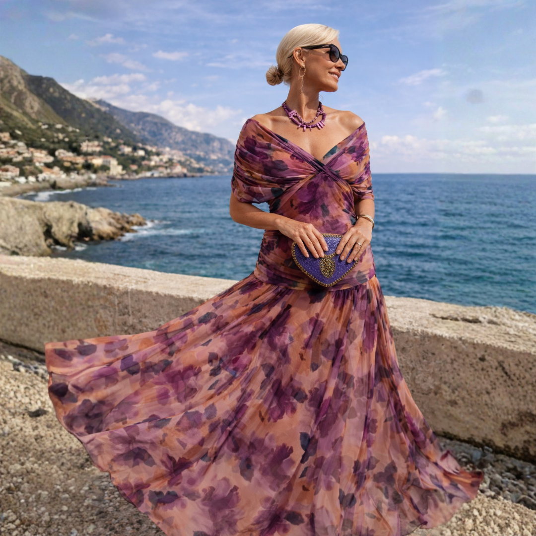 Woman wearing long flowing maxi dress with V-neck