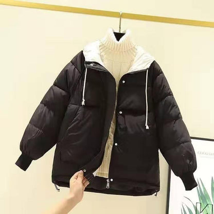 Woman wearing short padded winter coat with simple style