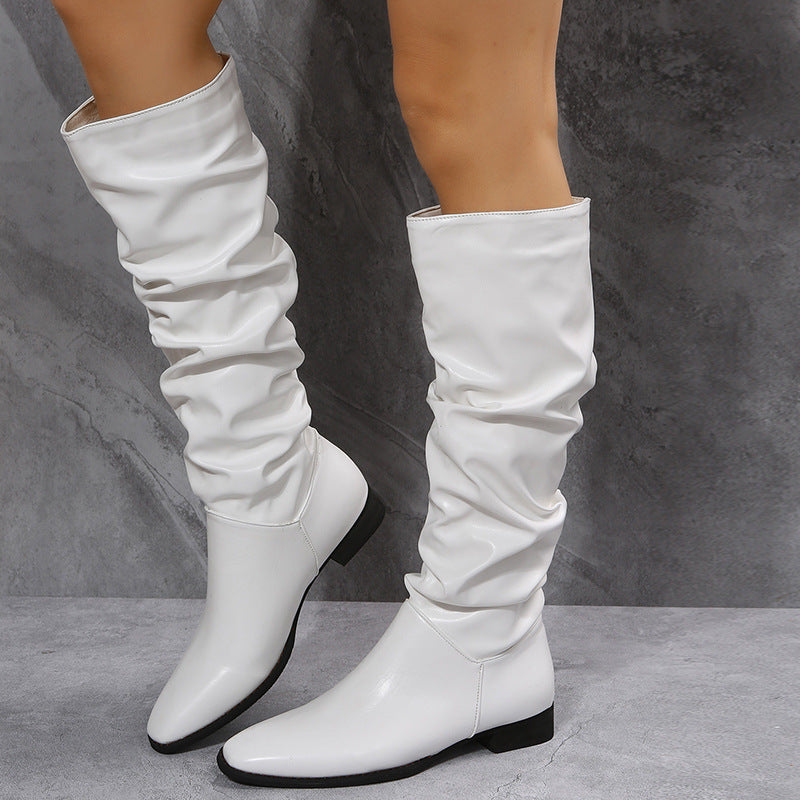 Women's tall boots in black and white with low heel