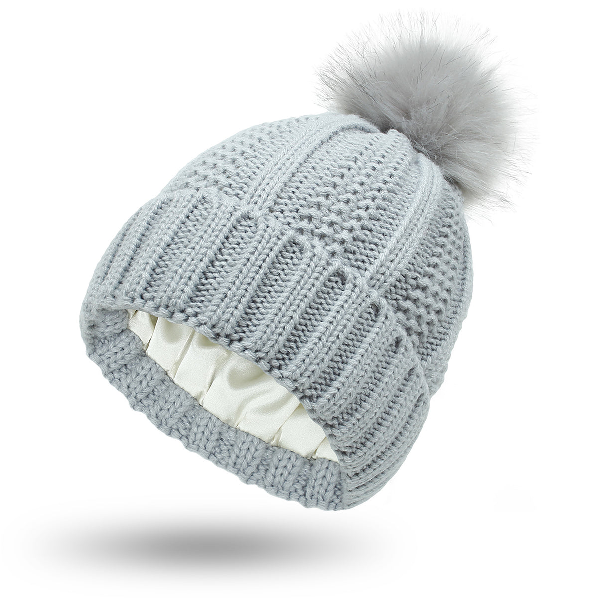 Women's knit beanie with faux fur pom pom