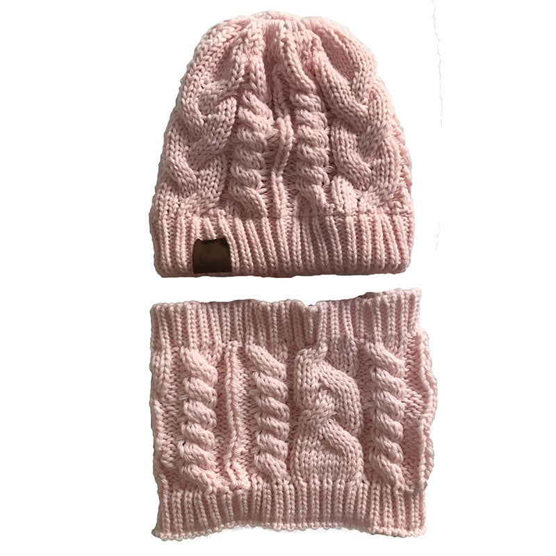 Women's knit hat and scarf set in neutral colors