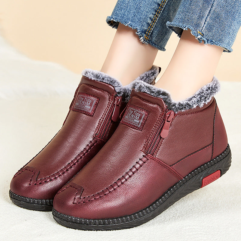 Women's black plush lined winter ankle boots with flat heel