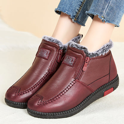 Women's black plush lined winter ankle boots with flat heel