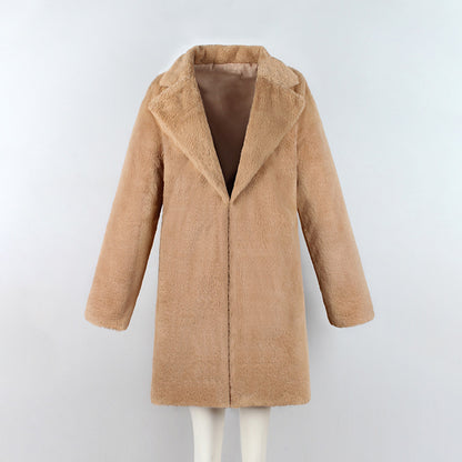 Woman wearing long faux fur coat streetwear