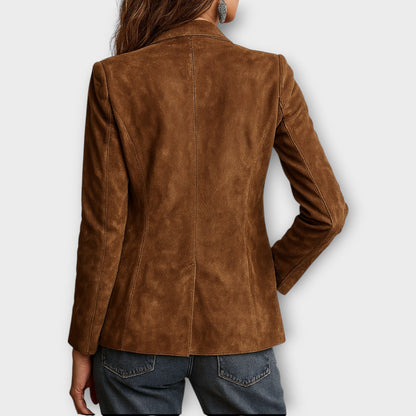 Woman wearing brown structured blazer with front buttons