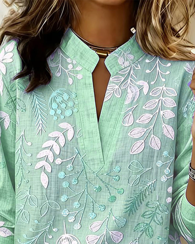 Women's draped V-neck floral blouse