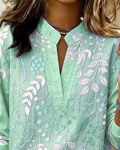 Women's draped V-neck floral blouse