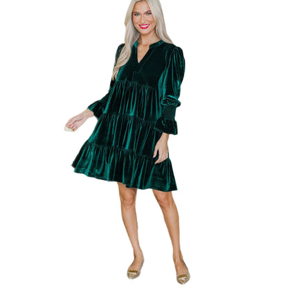 Woman wearing velvet V-neck mini dress with puffy sleeves