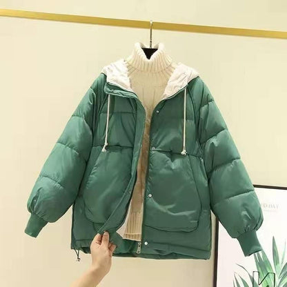 Woman wearing short padded winter coat with simple style