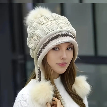 Women's knit beanie with ear flaps and pompom