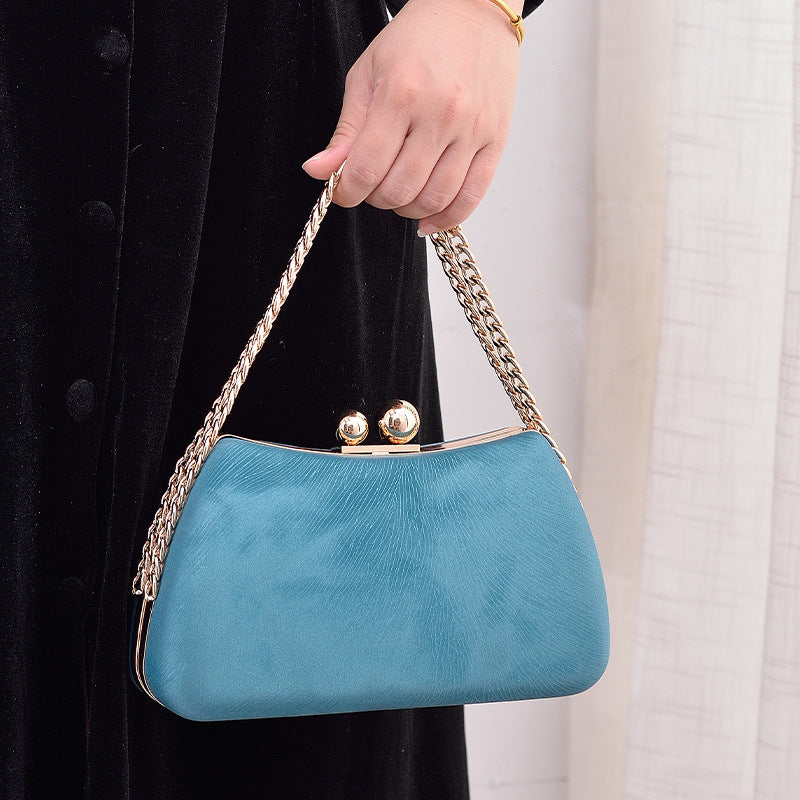 Women's chain shoulder bag with embossed pillow shape