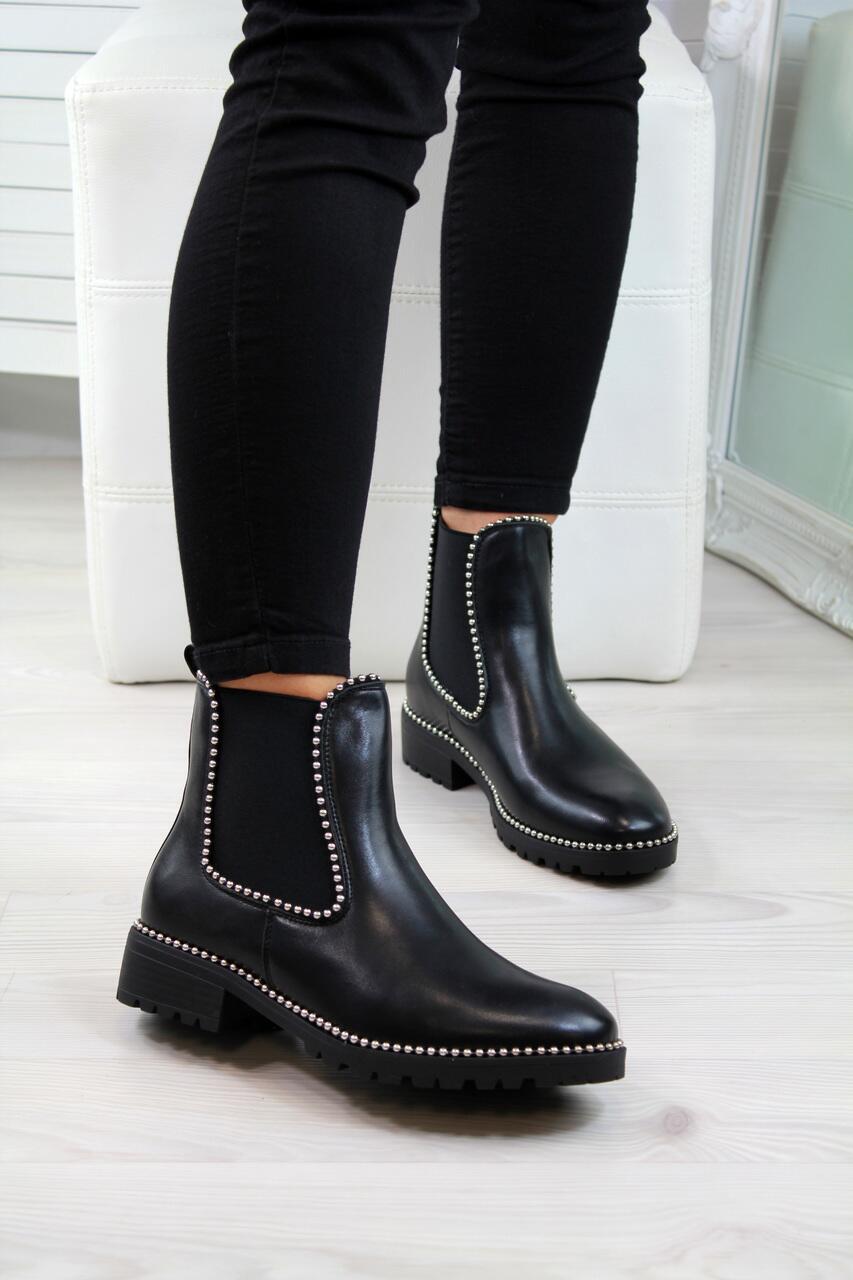 Women's black Martin boots with round toe and short shaft