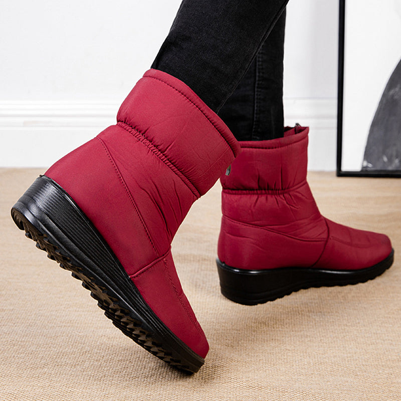 Women's winter snow boots with plush lining and platform sole