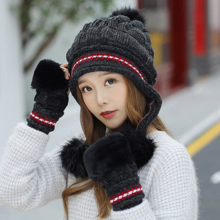 Women's knit beanie with ear flaps and pompom