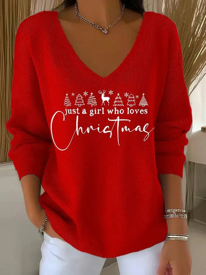 Woman wearing V-neck Christmas sweater with festive print
