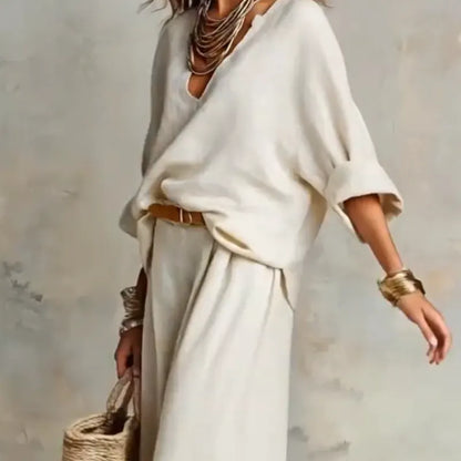 Woman wearing two piece set with wide leg pants