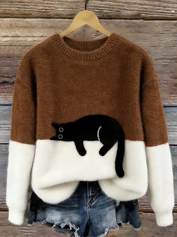 Woman wearing cat design knit sweater with long sleeves