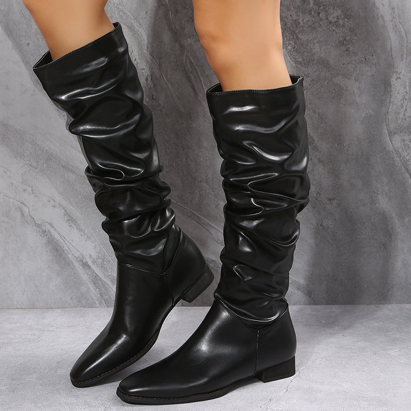 Women's tall boots in black and white with low heel