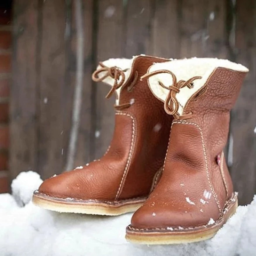Women's winter snow boots with plush lining and lace-up front