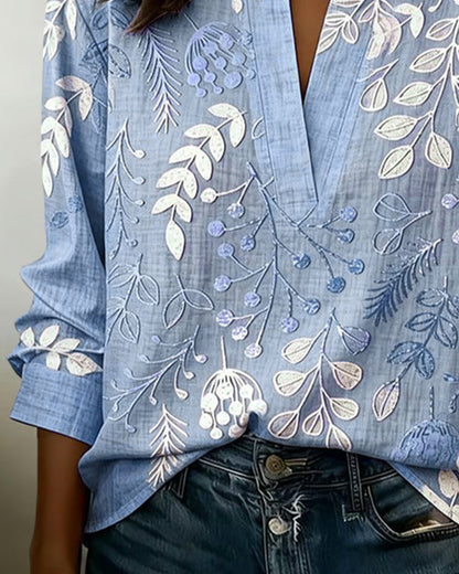 Women's draped V-neck floral blouse