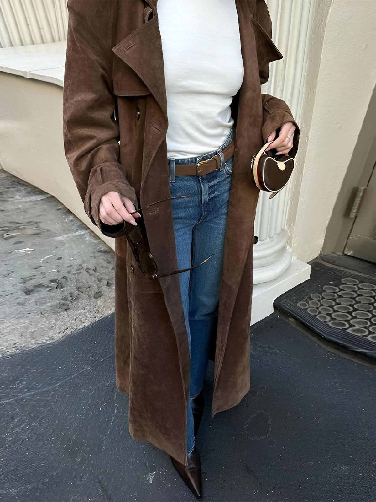 Woman wearing women's raincoat for rainy days