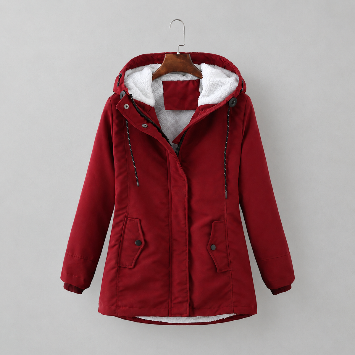 Woman wearing long quilted winter coat with hood