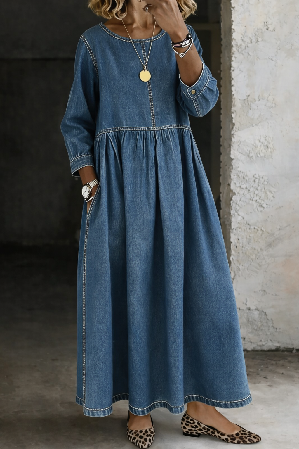 Woman wearing long sleeve gathered waist maxi dress