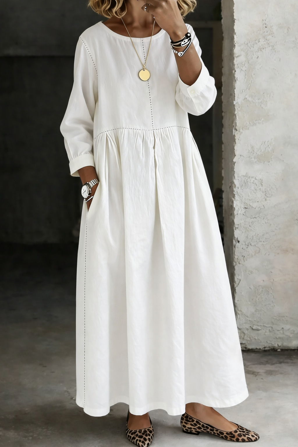 Woman wearing relaxed maxi dress with long sleeves