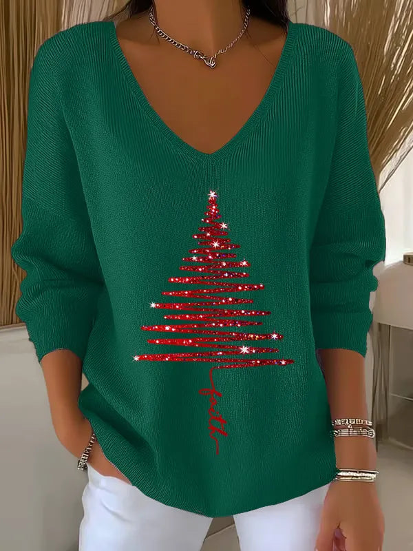 Woman wearing V-neck Christmas sweater with festive print