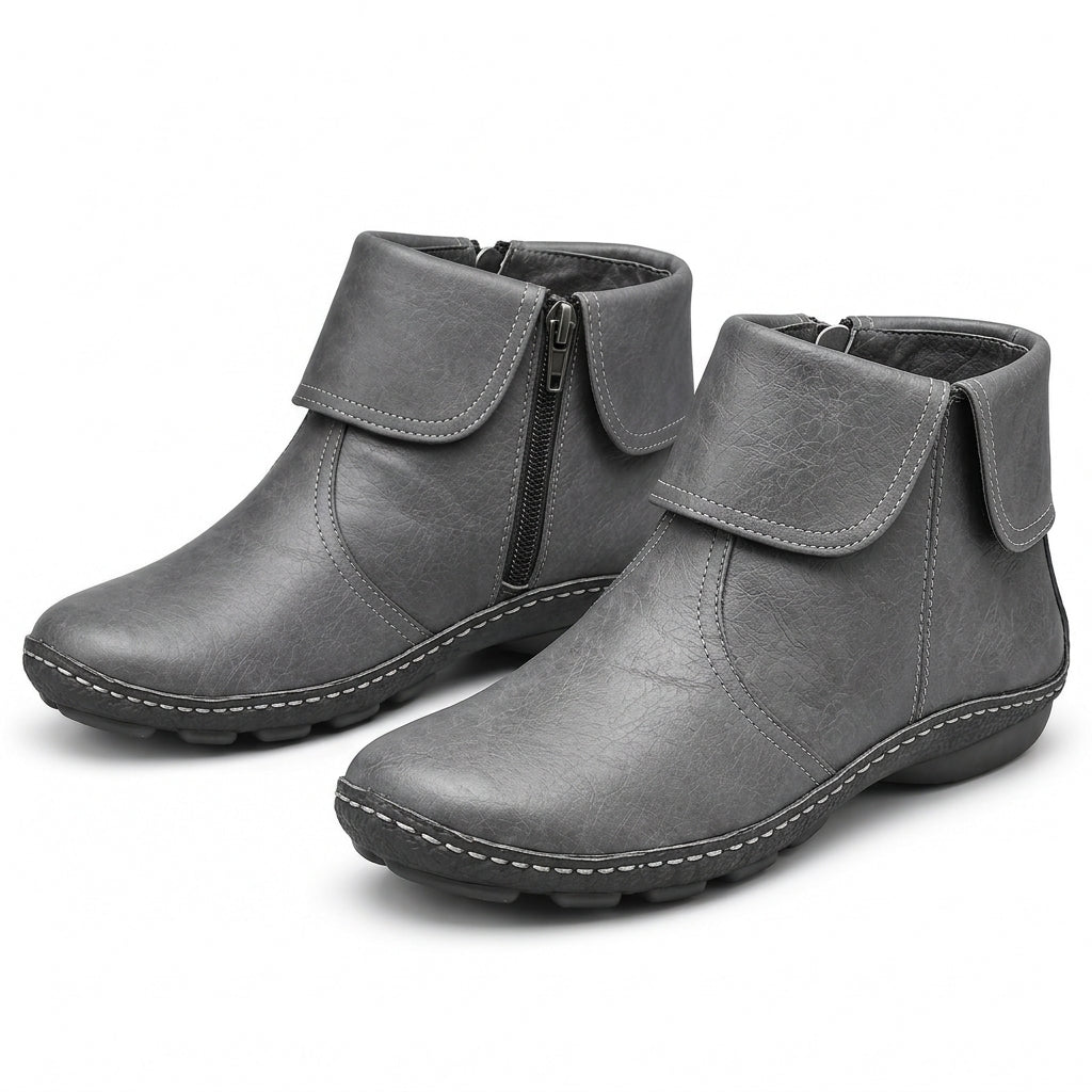 Women's black ankle boots with hook-and-loop strap and side zip