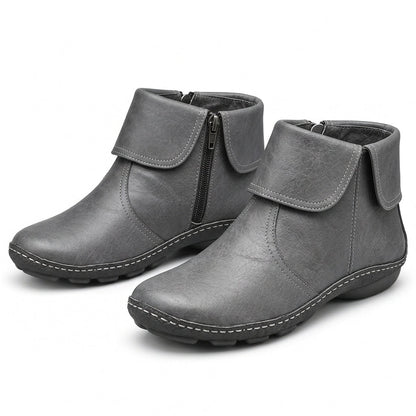 Women's black ankle boots with hook-and-loop strap and side zip