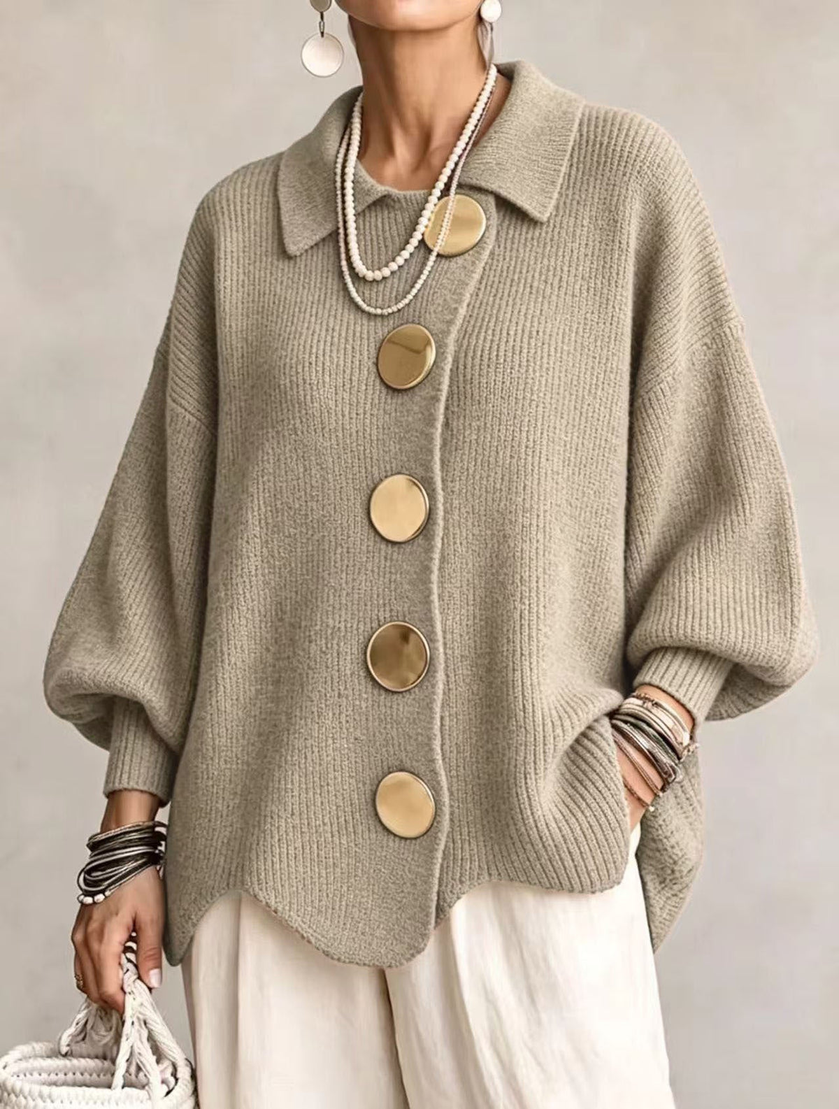 Woman wearing oversized cardigan with lantern sleeves