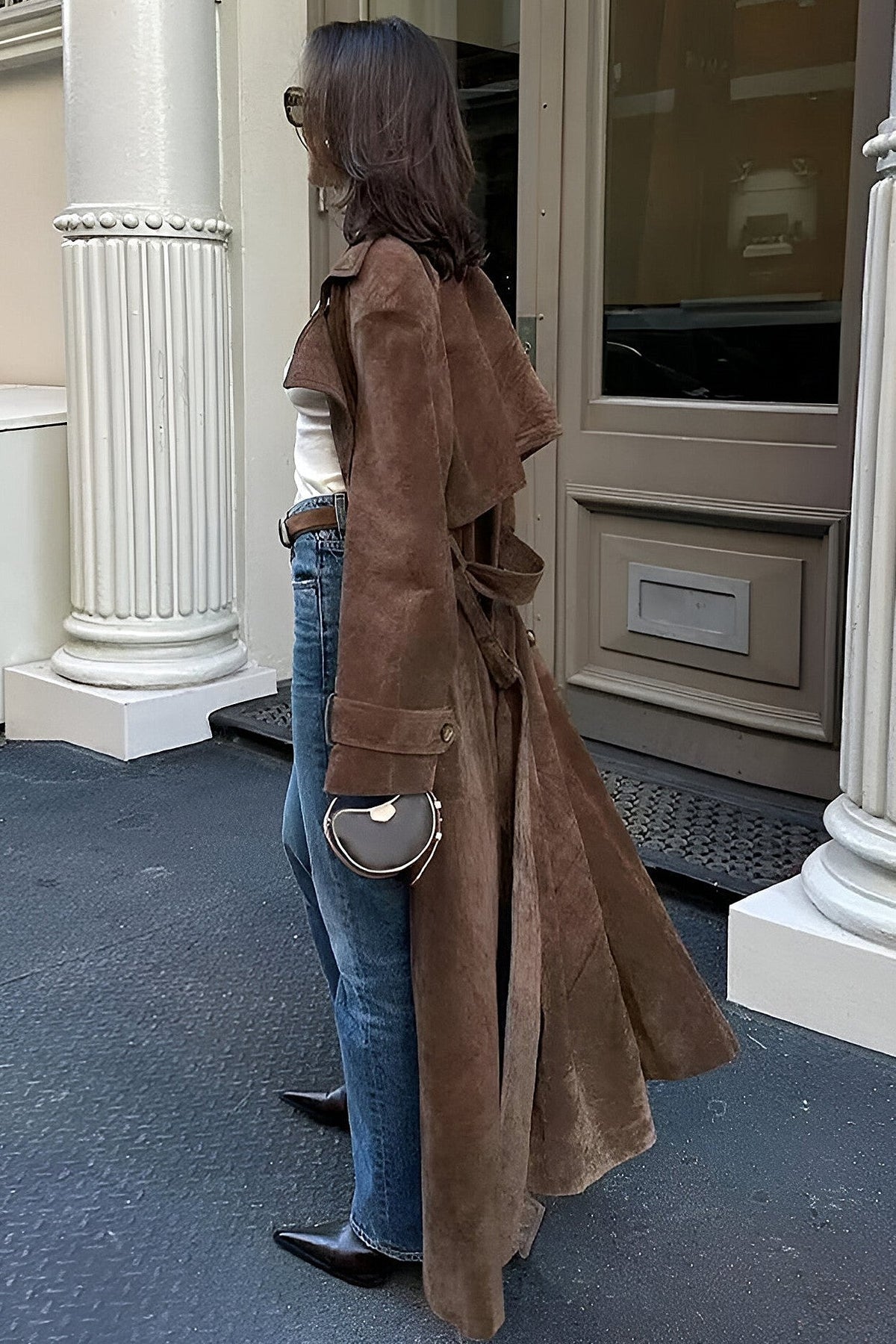 Woman wearing women's raincoat for rainy days
