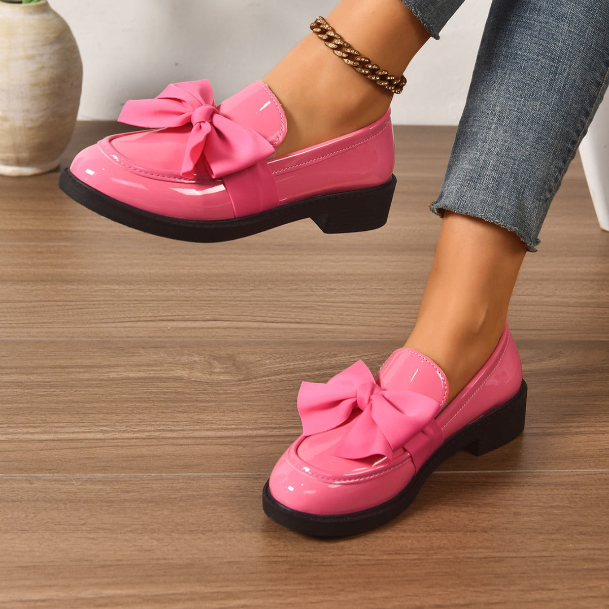 Women's pink bow loafers with platform sole