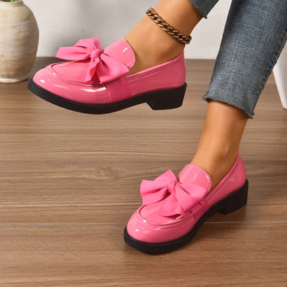 Women's pink bow loafers with platform sole