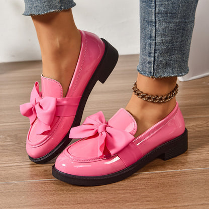 Women's pink bow loafers with platform sole