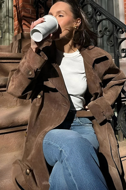 Woman wearing women's raincoat for rainy days